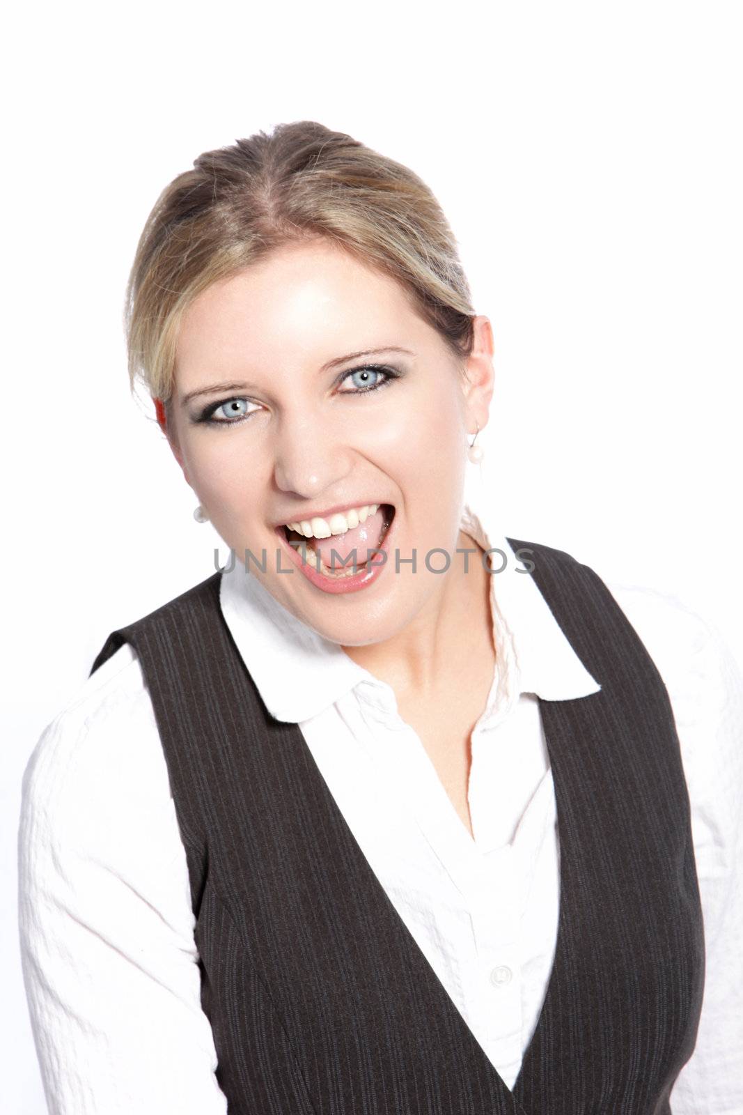 Laughing young businesswoman cheering and rejoicing at good news, head and shoulders portrait isolated on white