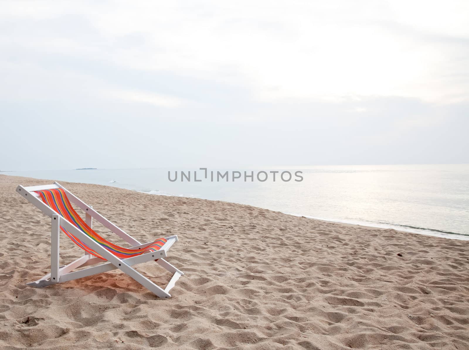 beach chair on tropical white sand