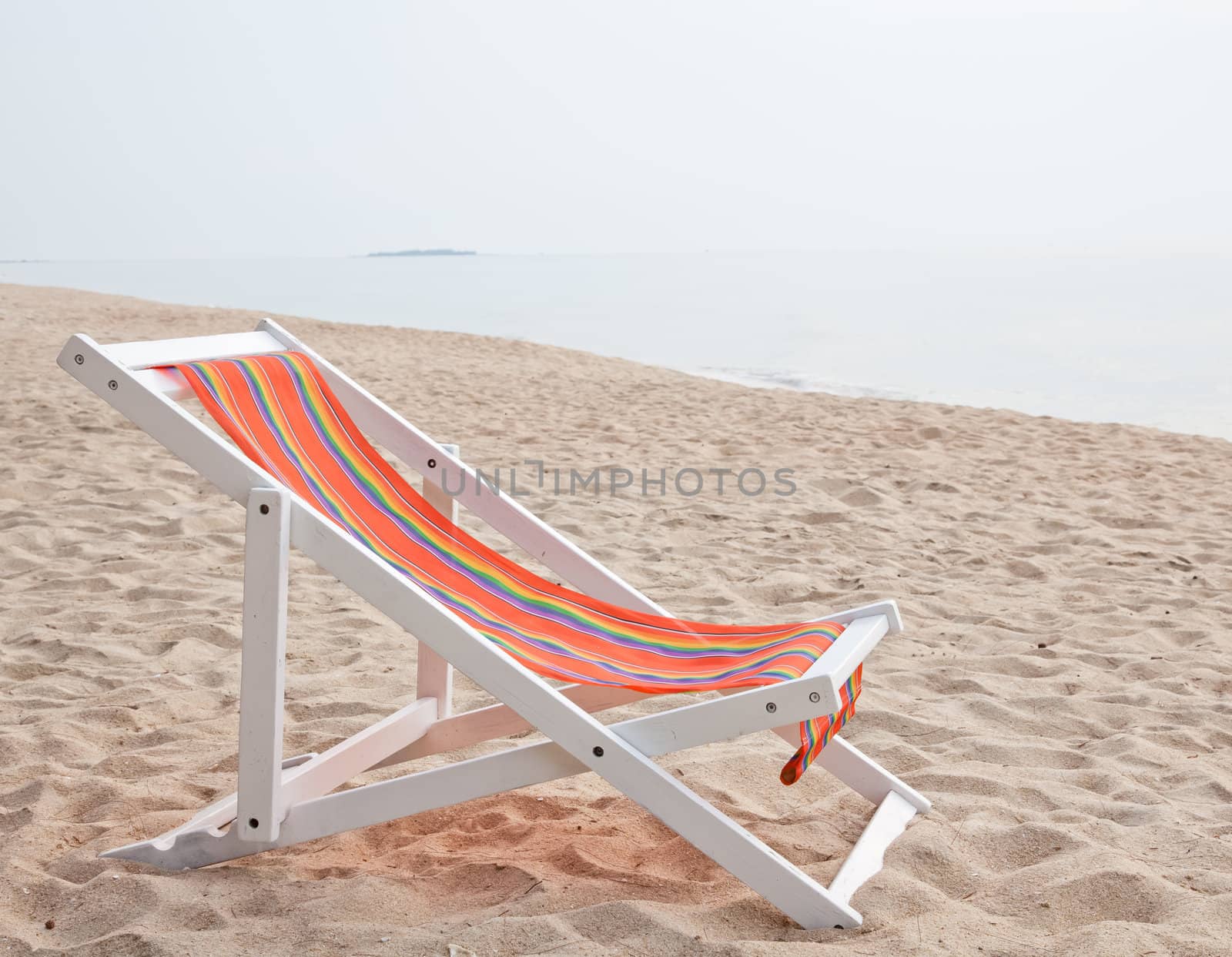 beach chair on tropical white sand