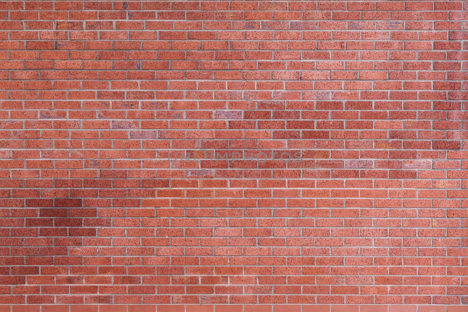 Close-up on the red brick wall