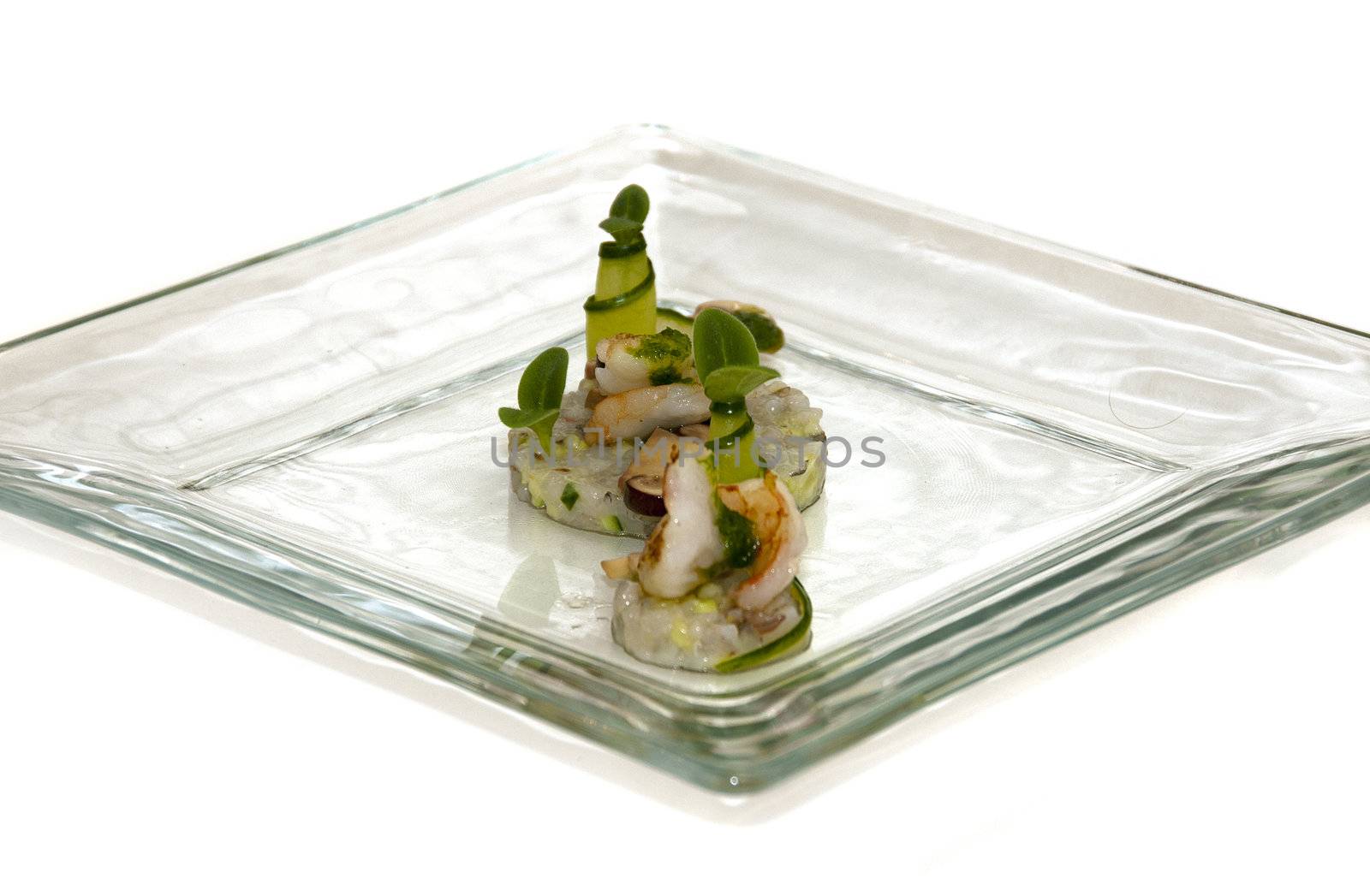 plate with fish cuisine isolated on white