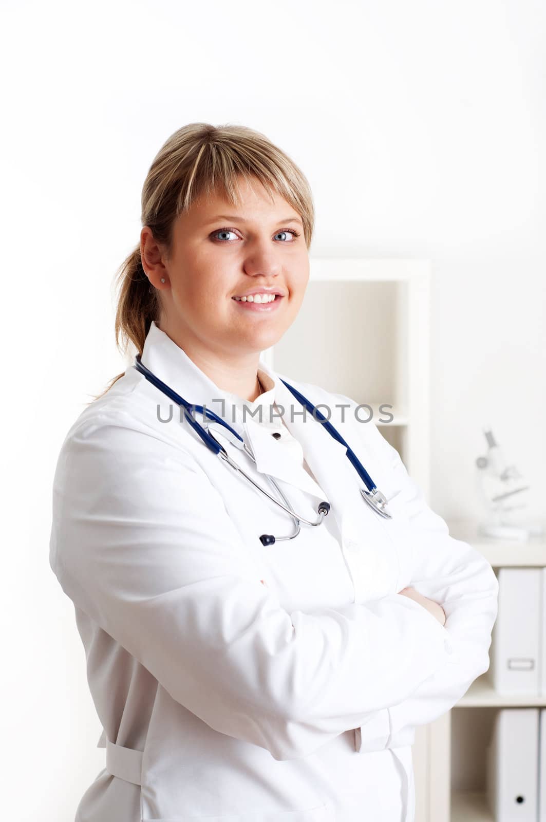 Smiling medical doctor woman with stethoscope. by adam121