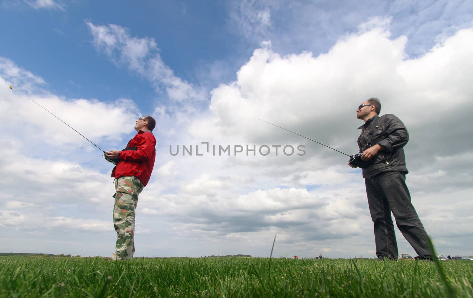 Two Man controls RC gliders in the sky