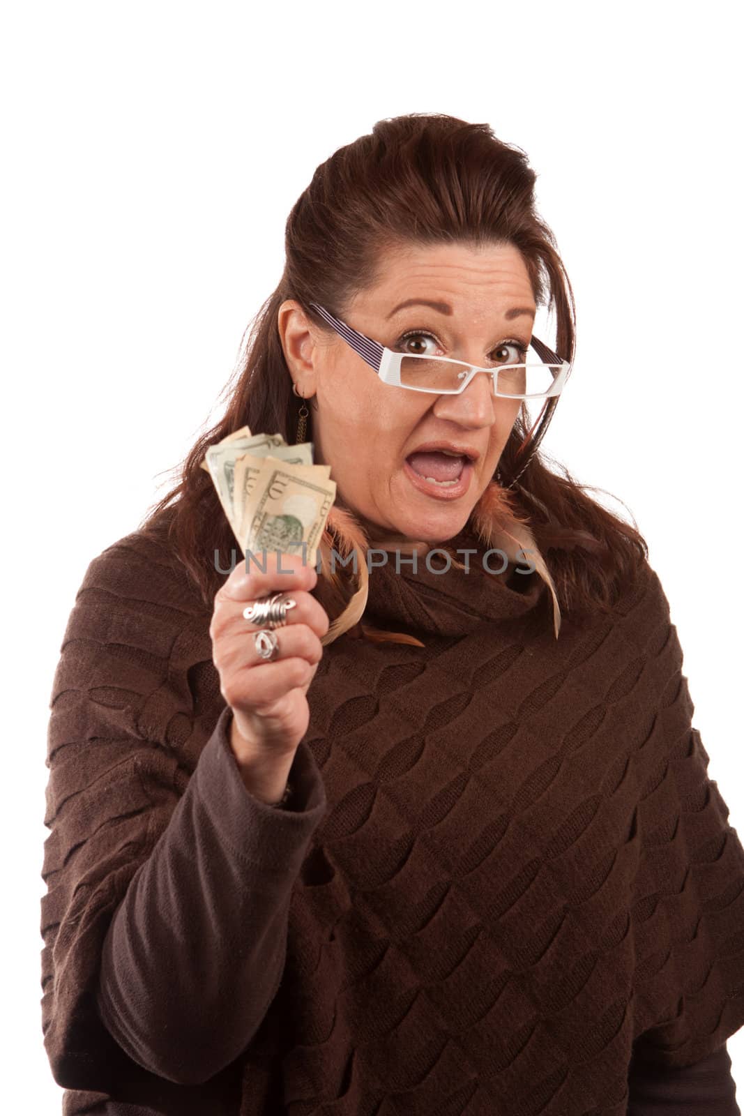 Woman holding money in her hand and shouting or cheering isolated on white.  A great concept for auction bidding or even shopping.