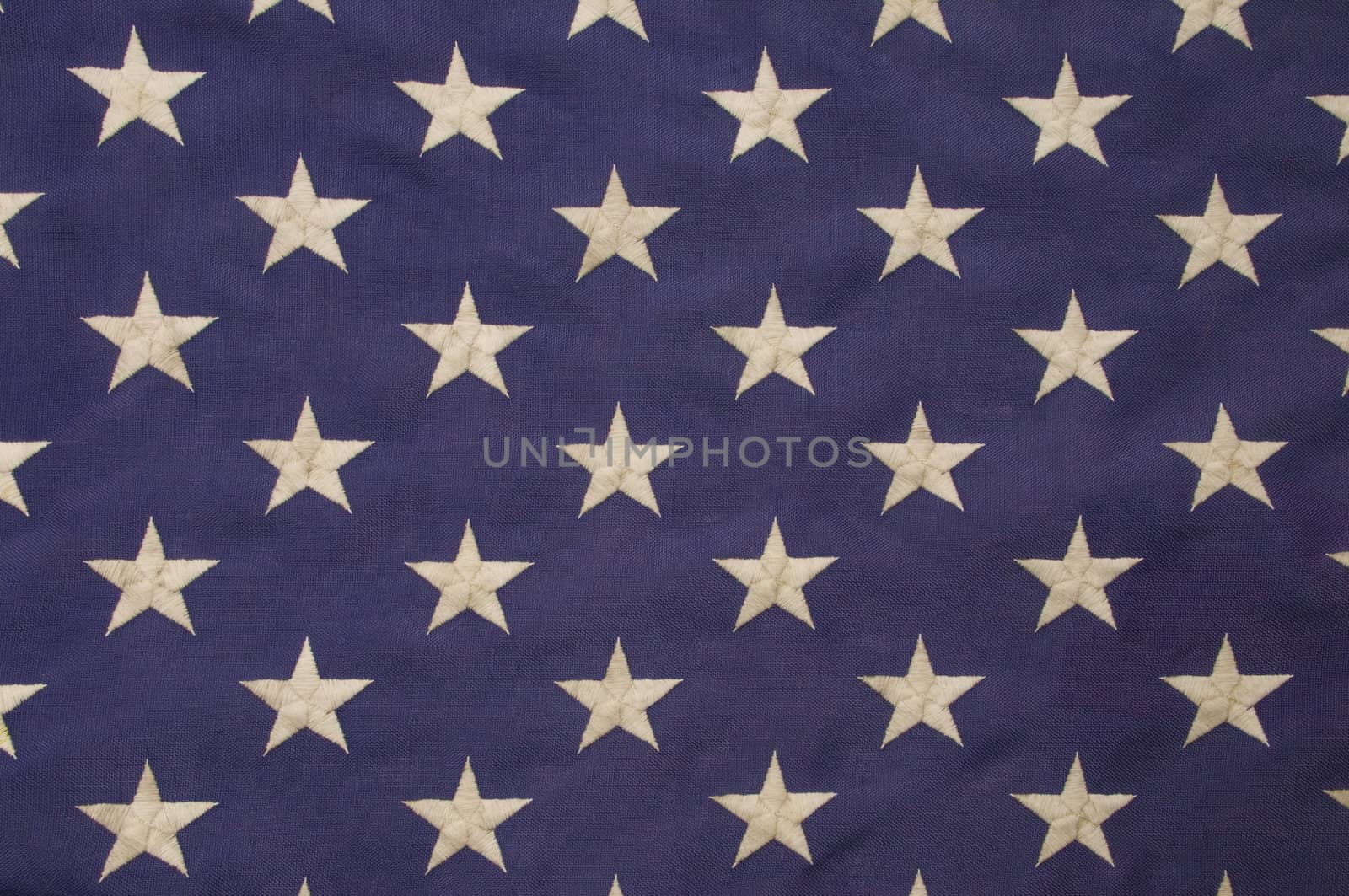 Embroidered white stars on a field of blue which represents the union on the American flag