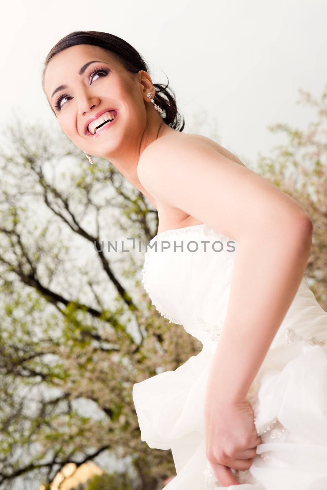 Portrait of happy beautiful bride smiling