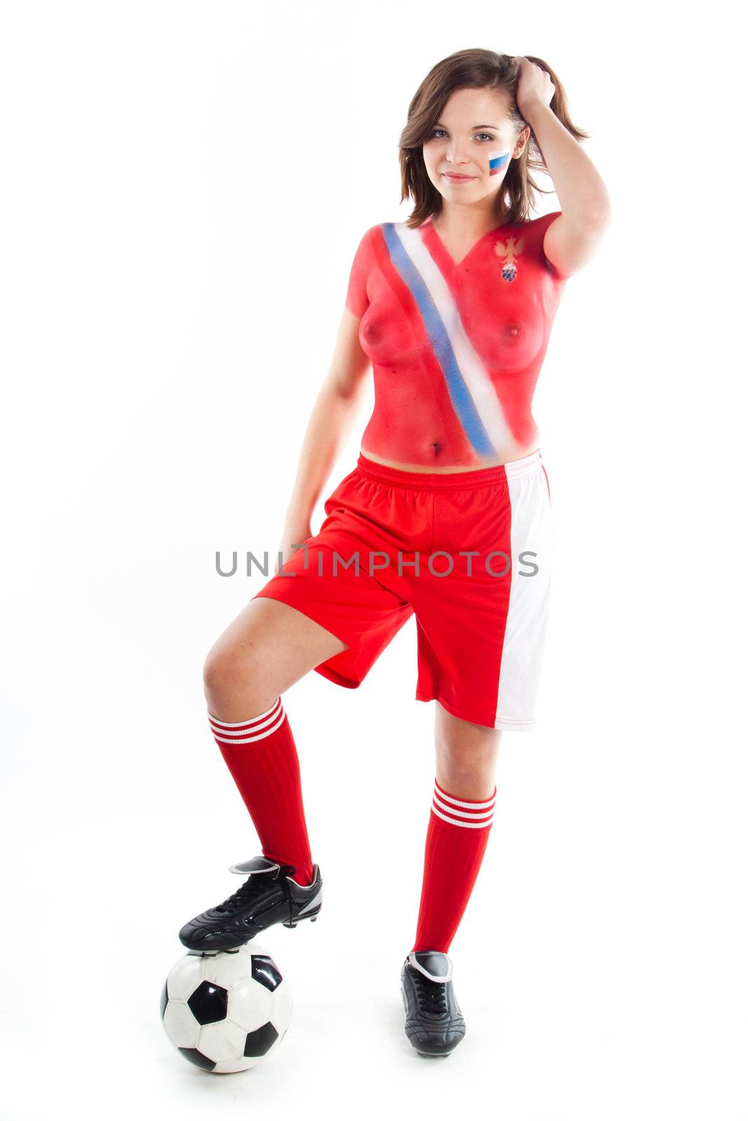 Photo of a beautiful young girl, the upper body is painted with colors in the style of the shape of the Russian national team