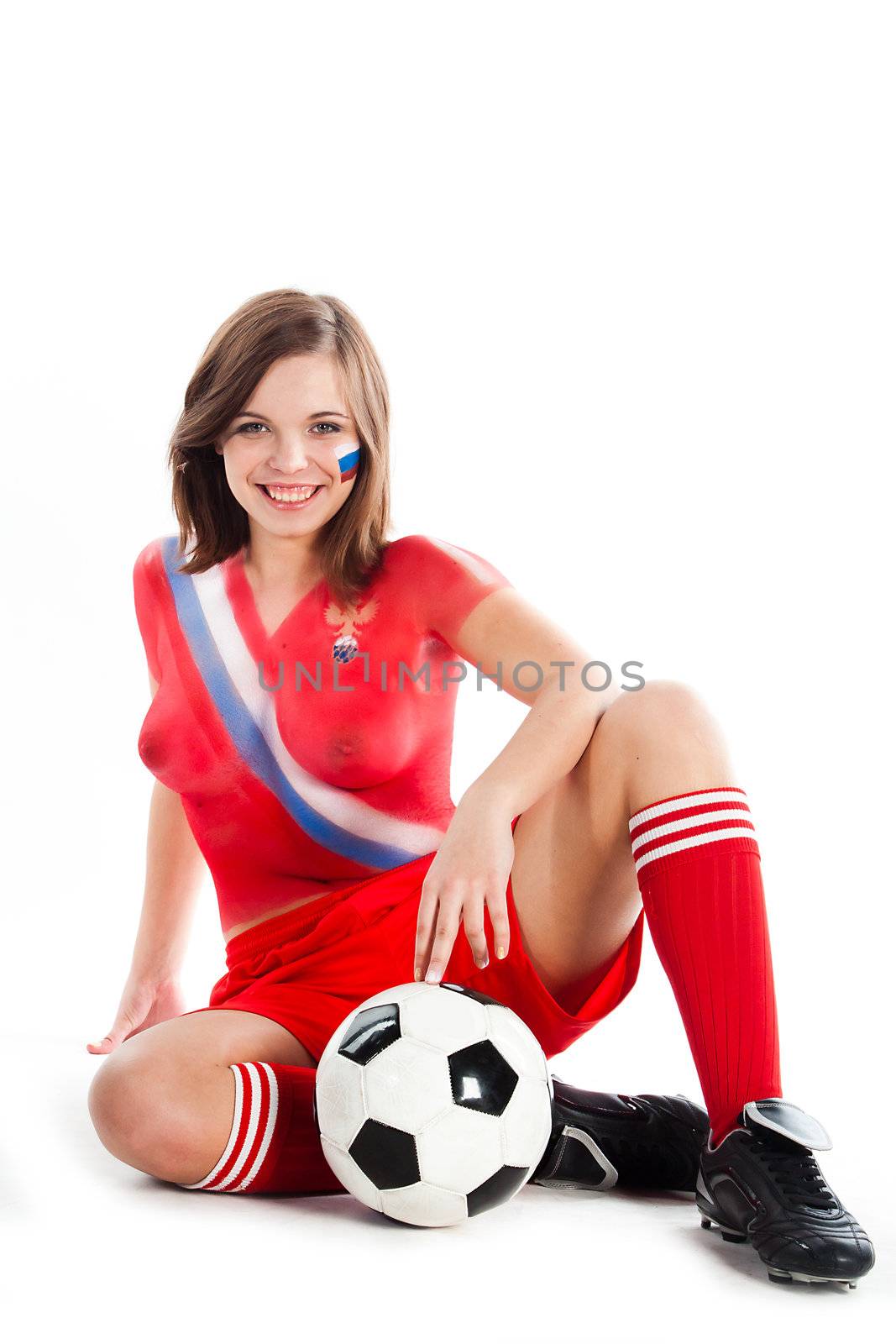 Photo of a beautiful young girl, the upper body is painted with colors in the style of the shape of the Russian national team