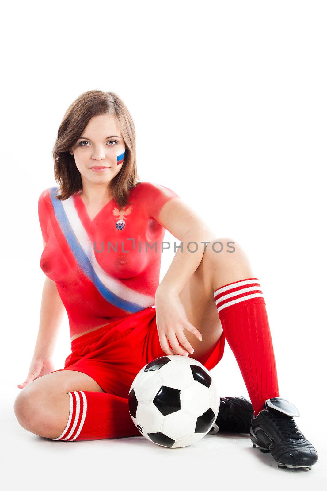 Photo of a beautiful young girl, the upper body is painted with colors in the style of the shape of the Russian national team