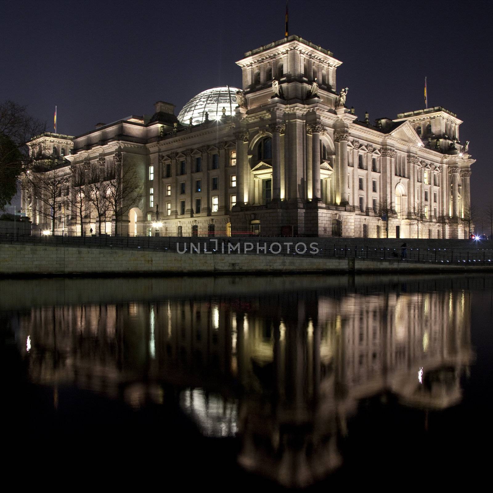 A view of the back of The Reichstag from across the river Spree in Berlin.