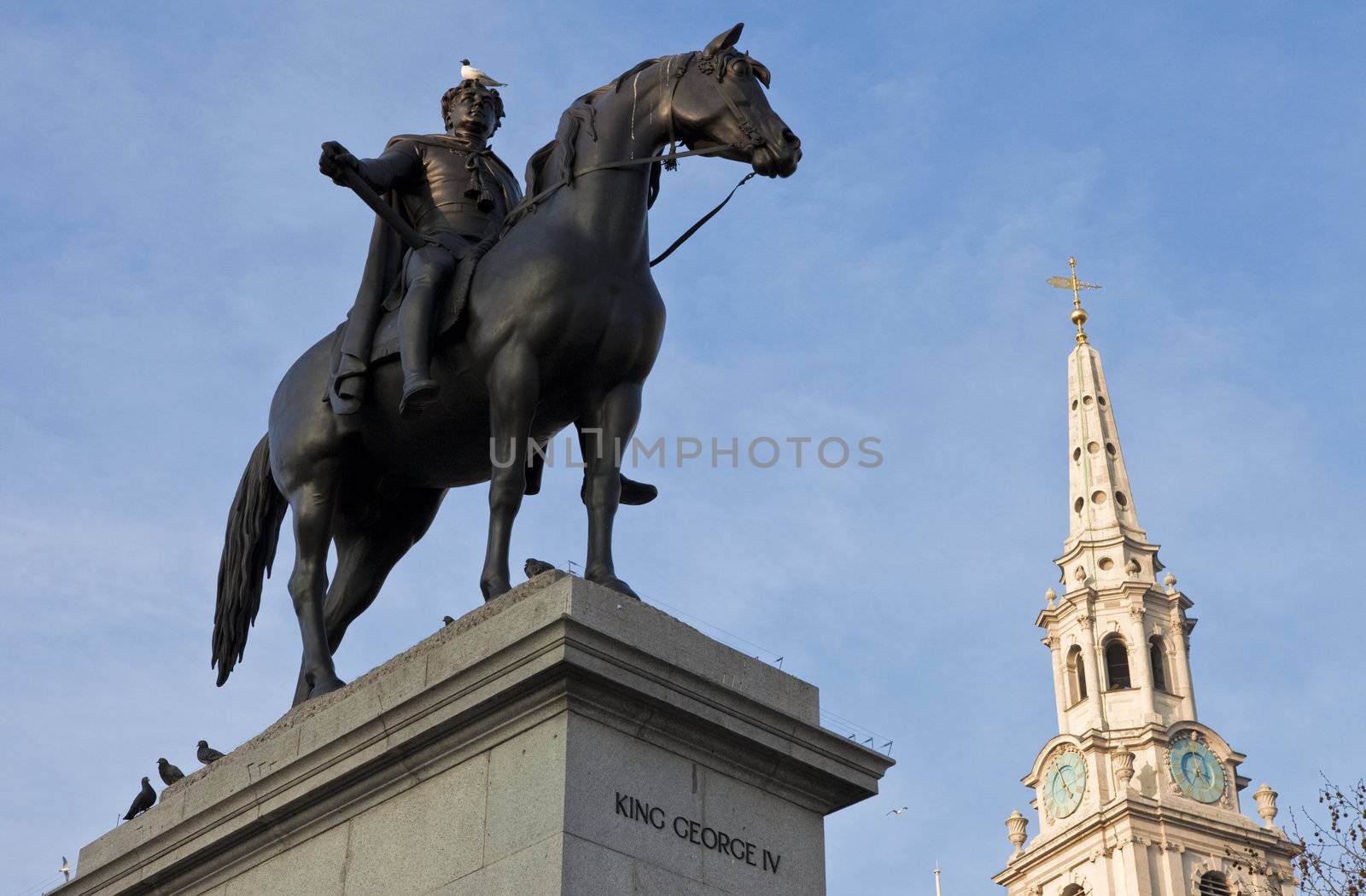 King George IV Statue and St Martin-in-the-Fields Church in London. by chrisdorney