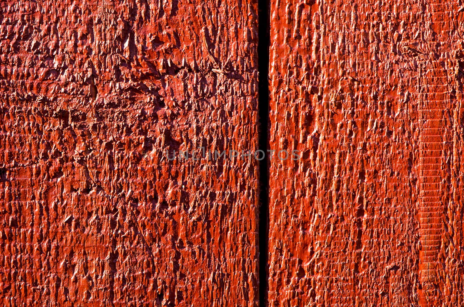 Background of wooden board plank wall painted red. Wood surface textures.