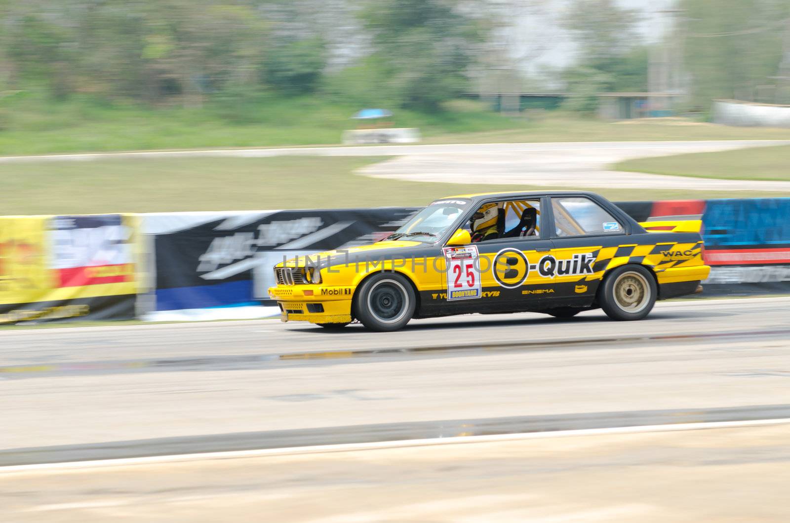Nakhon Ratchasima, Thailand - March 9th:Unidentified car racing competitors during the "Thailand circuit 2013  " at Bonanza speedway on March 9th, 2013 in Nakhon Ratchasima, Thailand. 