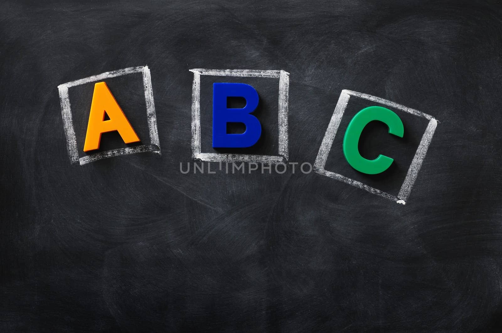 ABC made of color letters on a blackboard