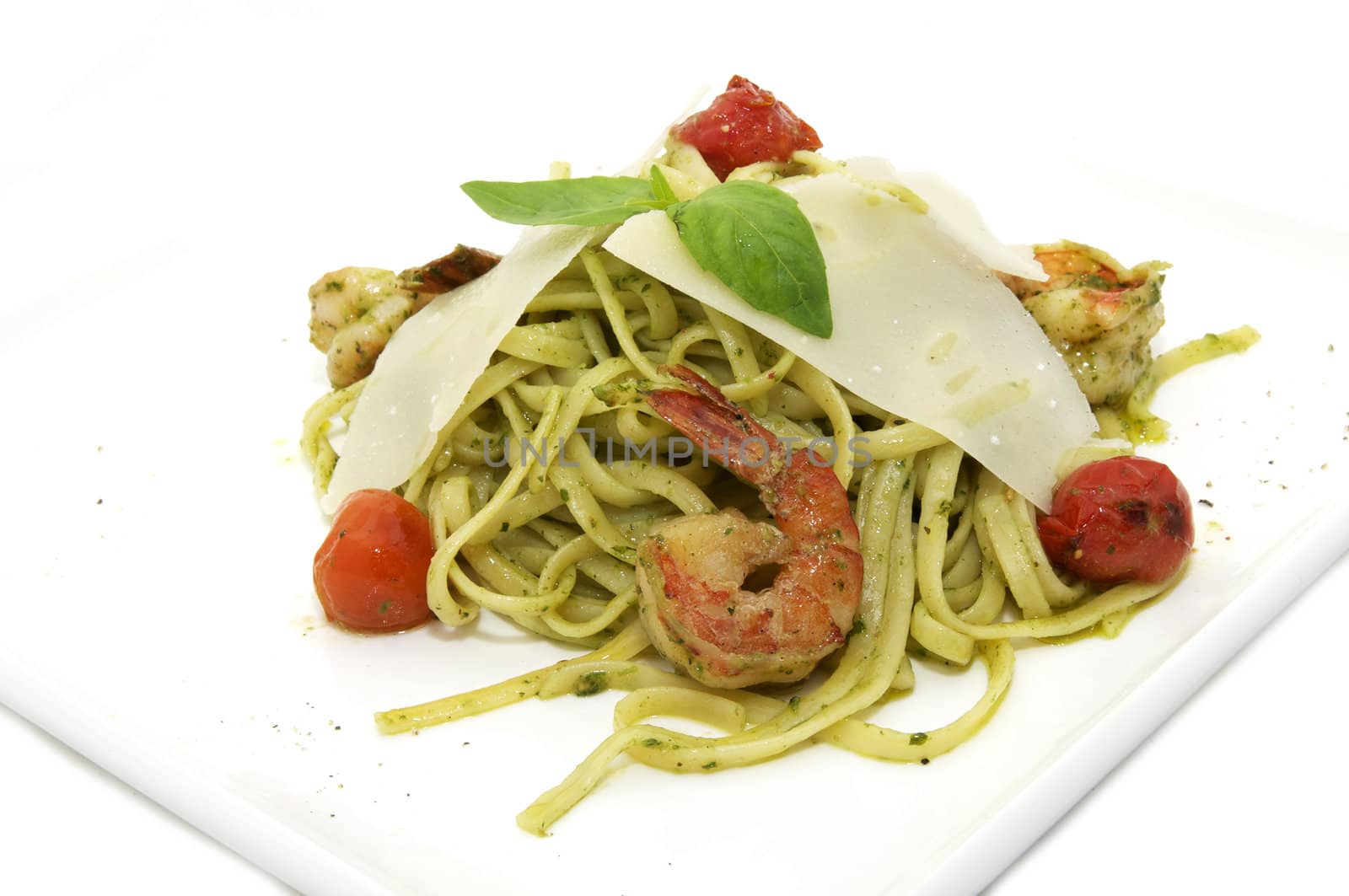 Spaghetti with prawns and cherry tomatoes on the cheese plate