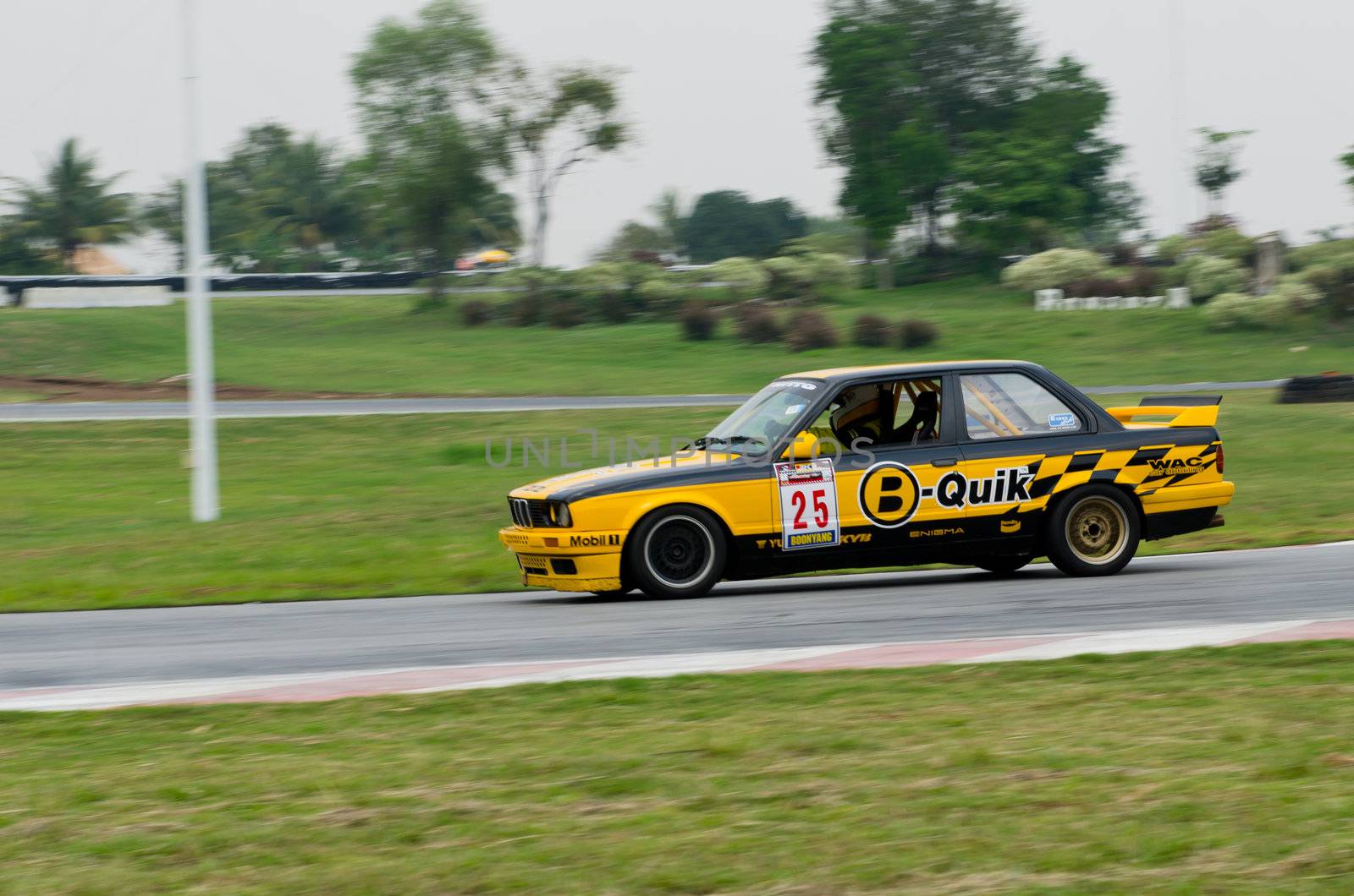 Nakhon Ratchasima, Thailand - March 9th:Unidentified car racing competitors during the "Thailand circuit 2013  " at Bonanza speedway on March 9th, 2013 in Nakhon Ratchasima, Thailand. 