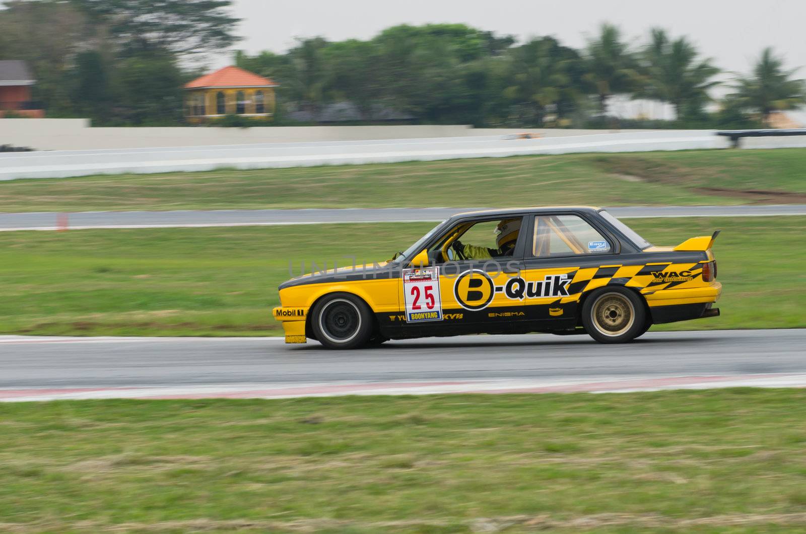 Nakhon Ratchasima, Thailand - March 9th:Unidentified car racing competitors during the "Thailand circuit 2013  " at Bonanza speedway on March 9th, 2013 in Nakhon Ratchasima, Thailand. 