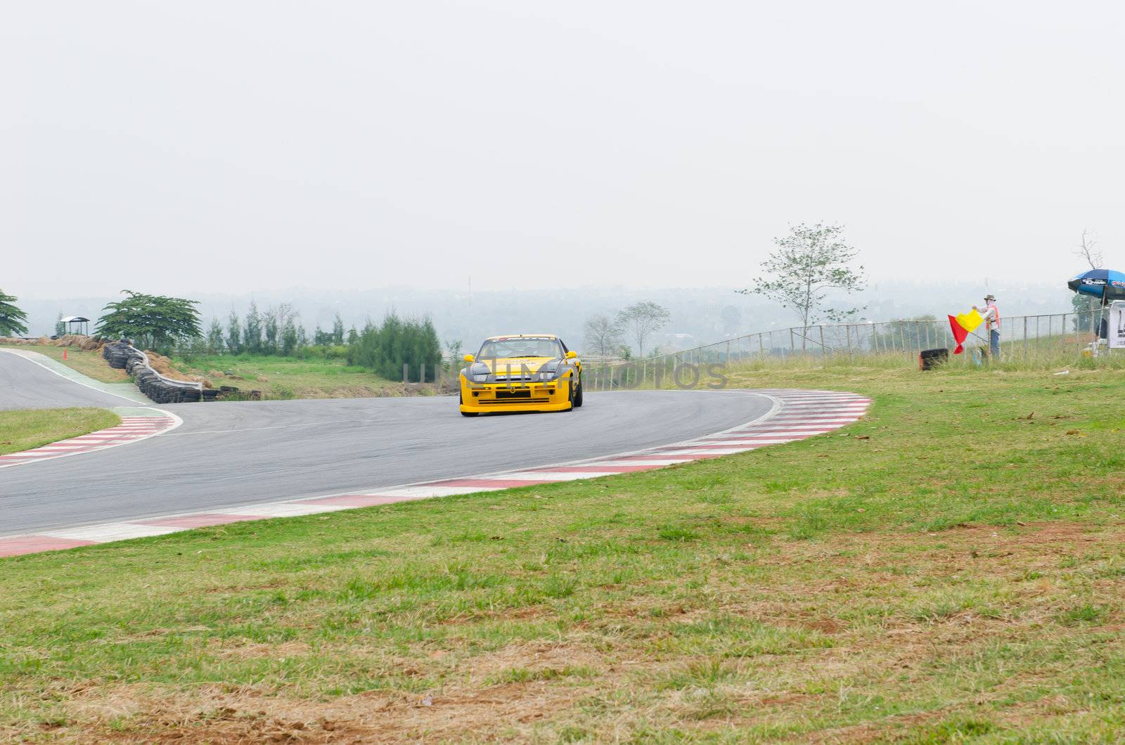 Nakhon Ratchasima, Thailand - March 9th:Unidentified car racing competitors during the "Thailand circuit 2013  " at Bonanza speedway on March 9th, 2013 in Nakhon Ratchasima, Thailand. 
