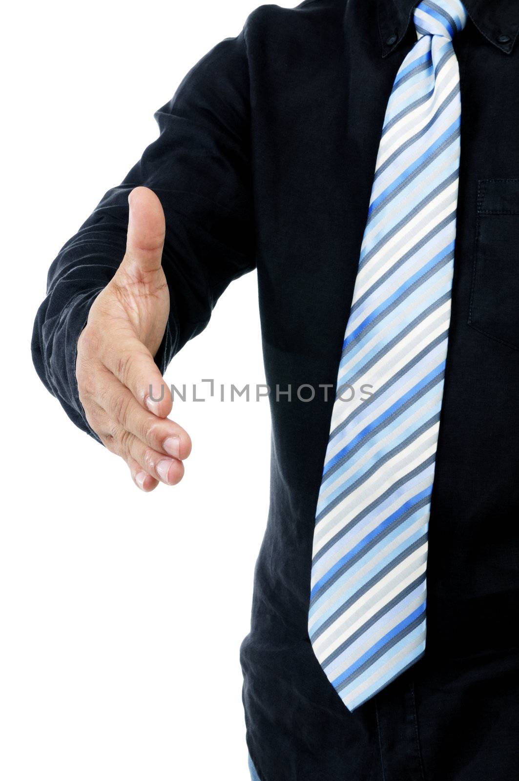 Closeup of businessman offering handshake on white background.