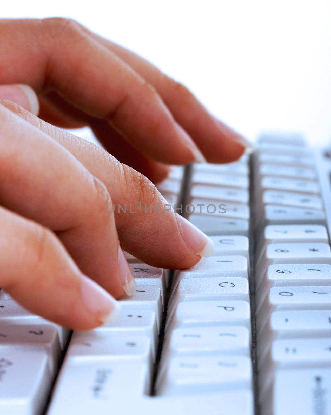 Close Up Of Someone Entering Information On A Computer Keyboard