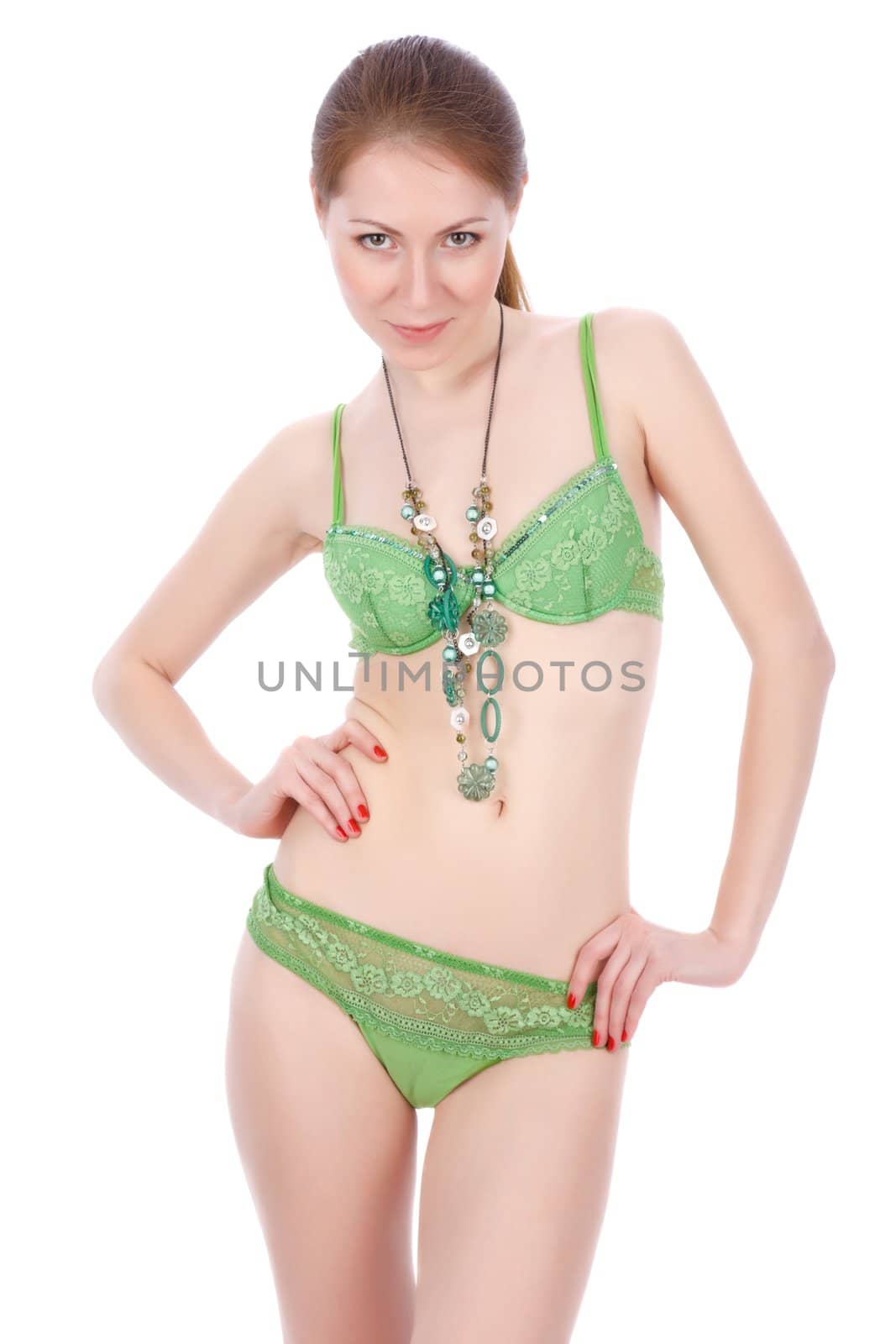 Slim attractive female in green lingerie.