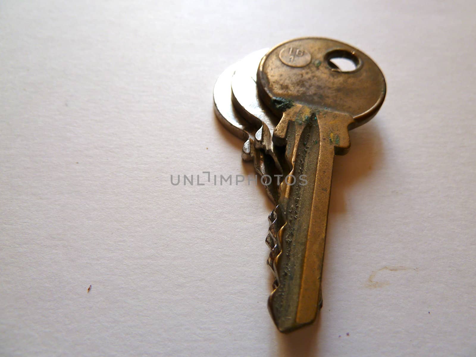 old keys on white as a background