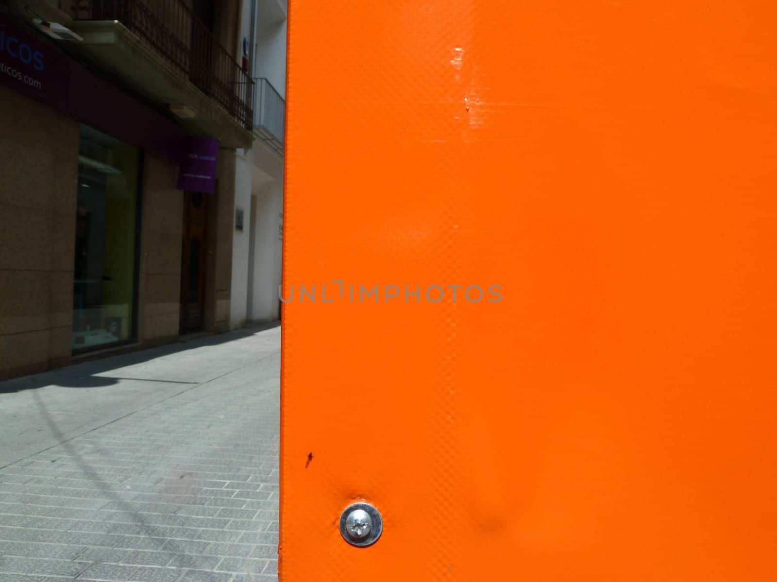 plastic orange block and partial street