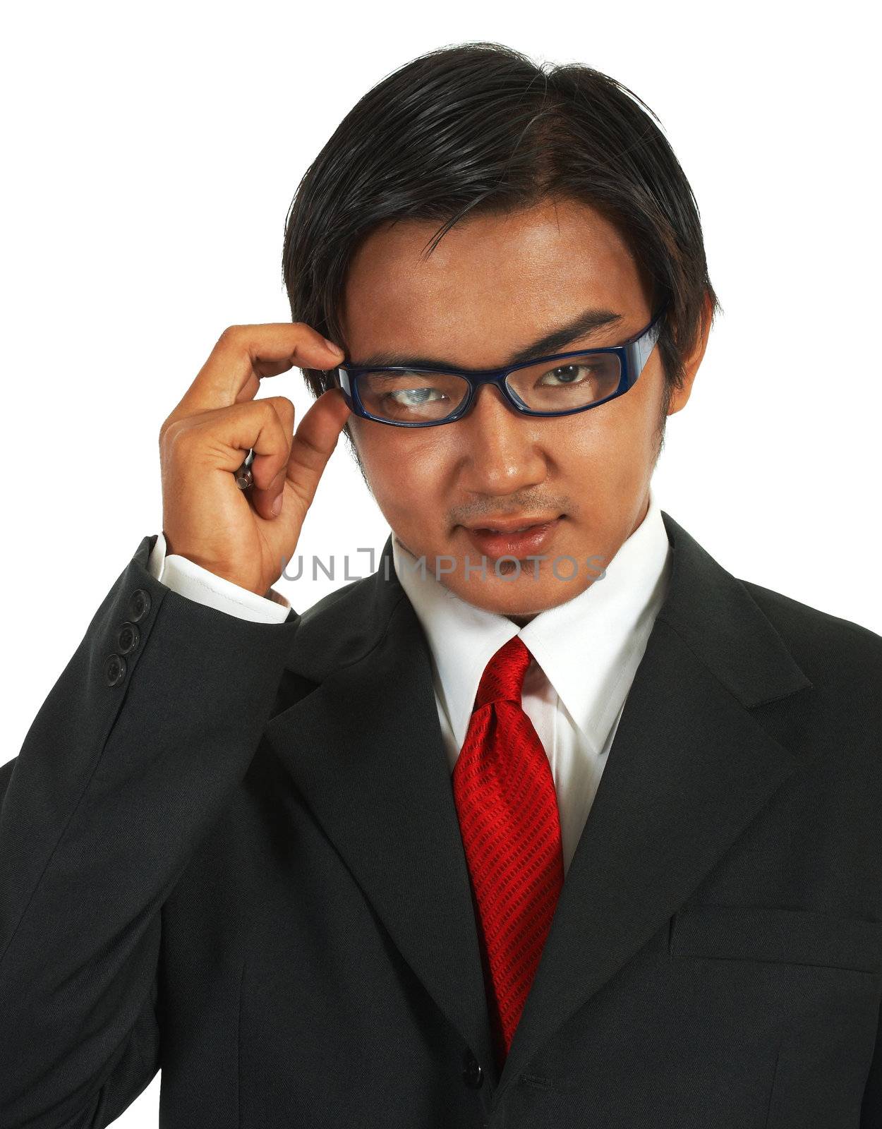 Businessman In Suit And Tie Wearing Glasses