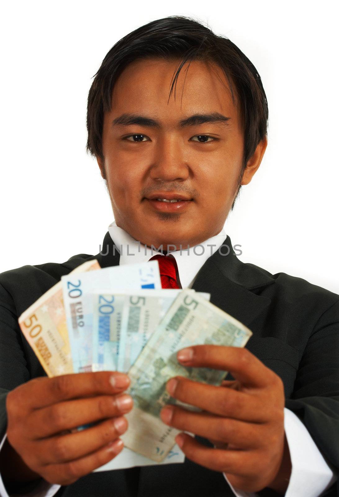 Smiling Businessman Holding Euros For A Payment