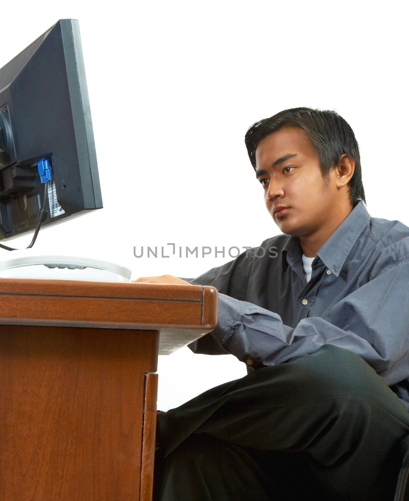 Young Programmer In His Office Working On A Computer Program