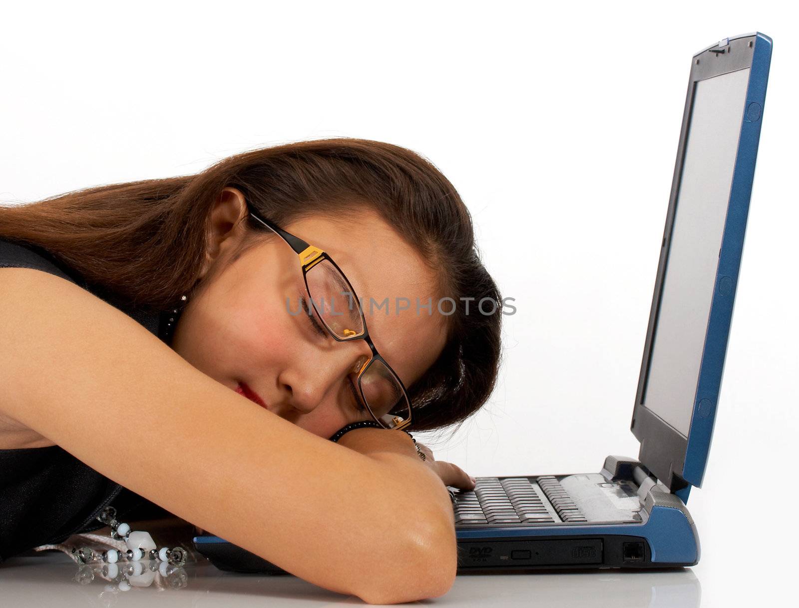 Girl Asleep On Her Notebook Computer by stuartmiles