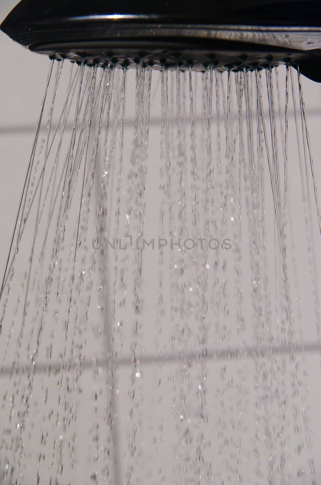 water drops falling from a shower indoors