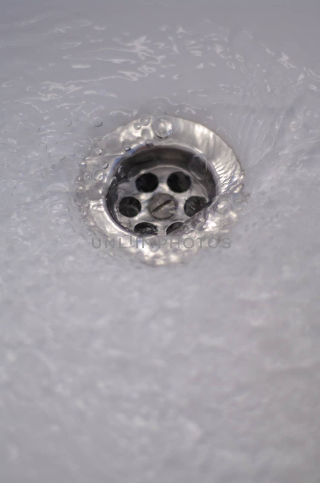 water drops falling from a shower indoors