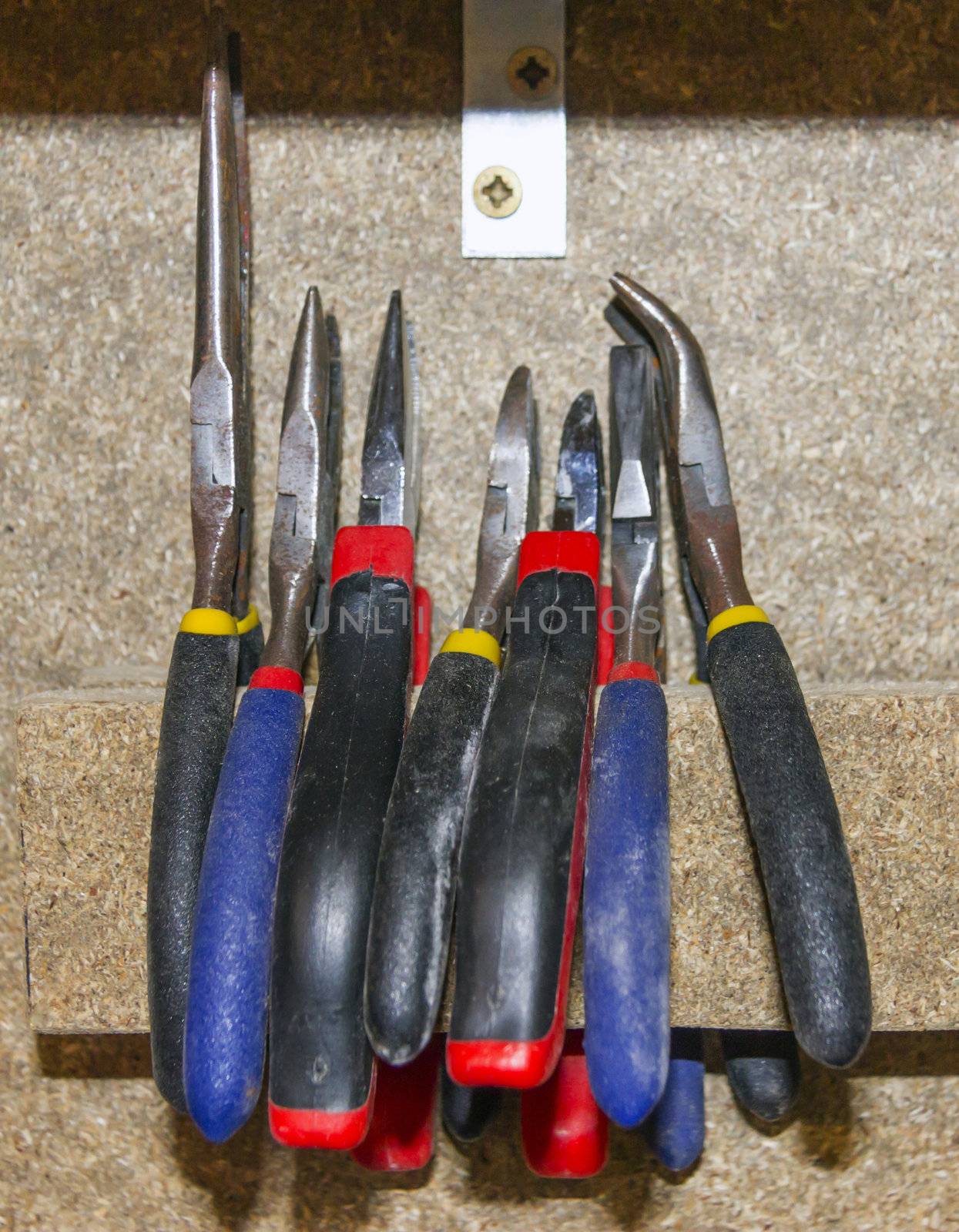 operating handle pliers in the carpentry workshop