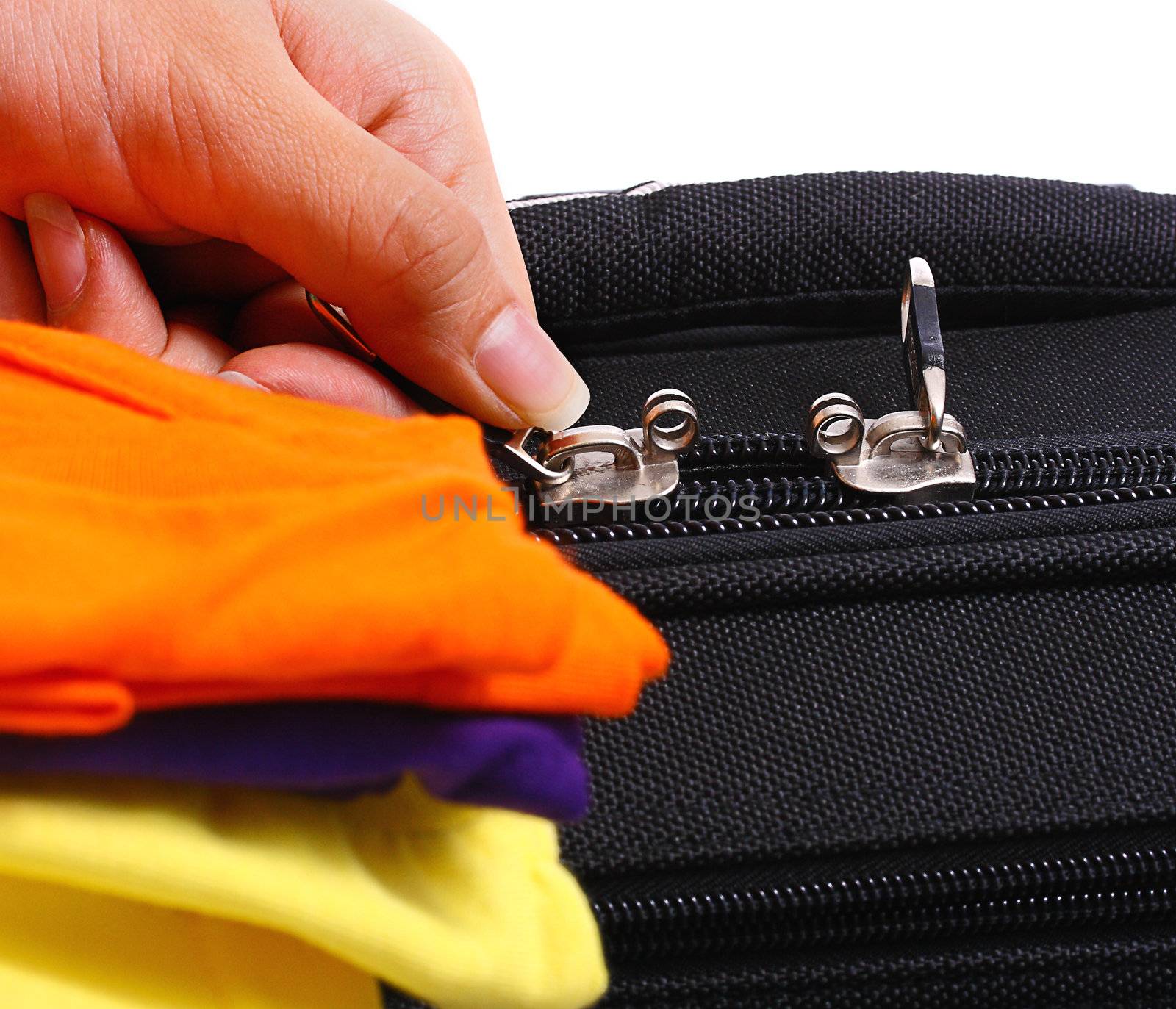 Packing Suitcase With Clothes Ready For A Vacation