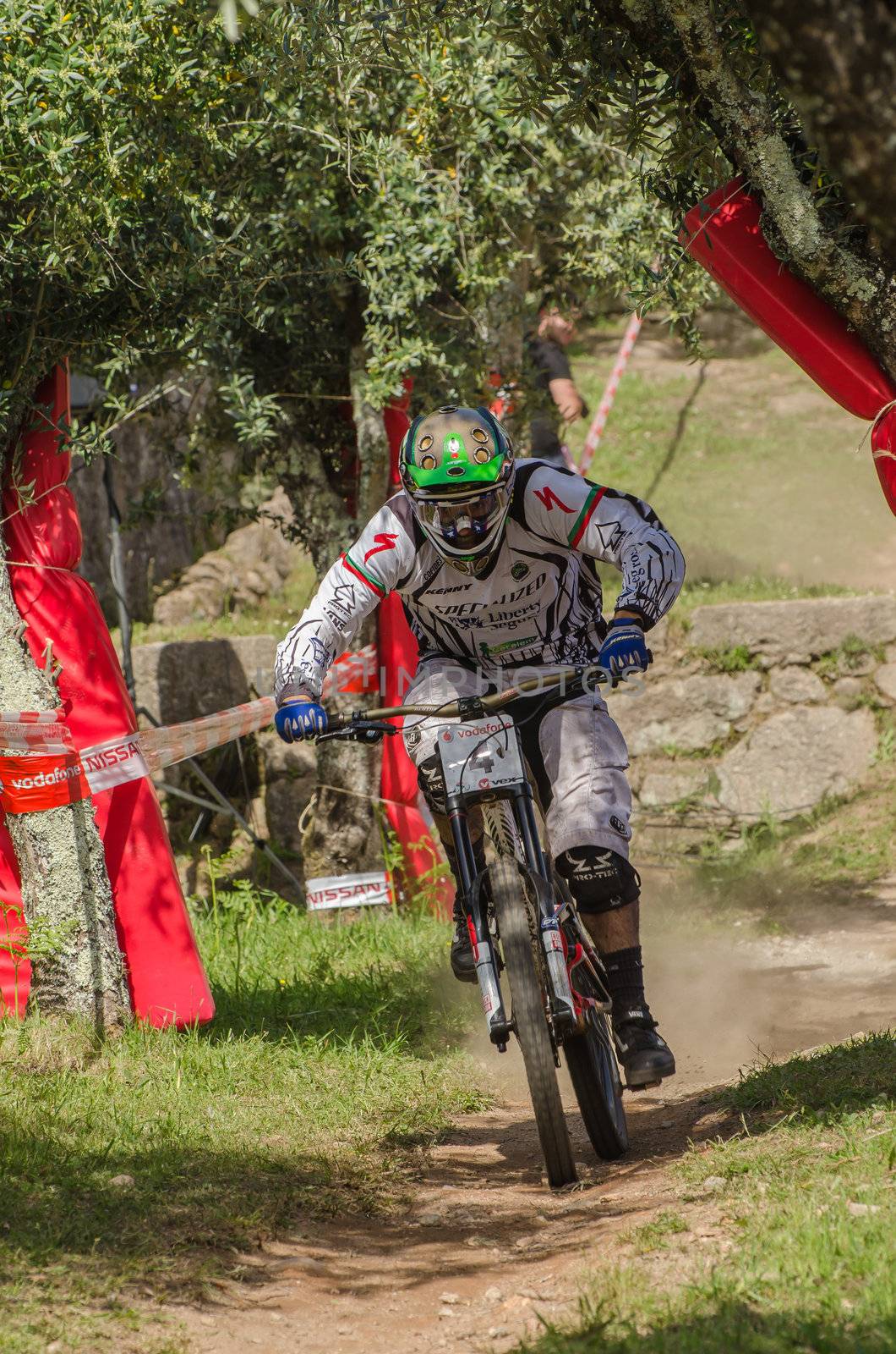 VIANA DO CASTELO, PORTUGAL - MAY 13: Daniel Pombo latest meters before finish line at the 4th Stage of the Taca de Portugal Downhill Vodafone on may 13, 2012 in Viana do Castelo, Portugal.