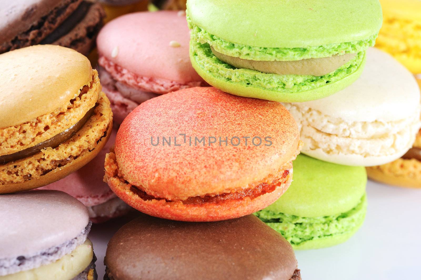 Colorful macaroons on white background 