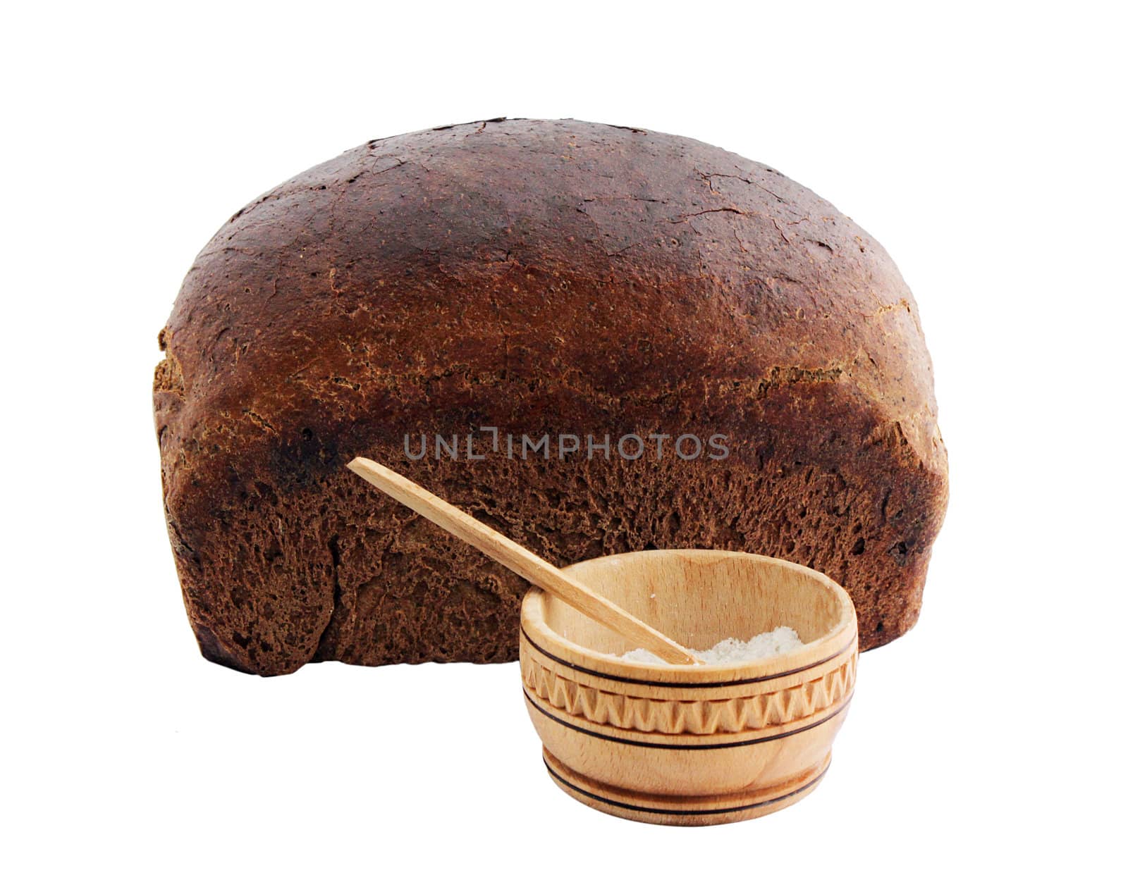 brown bread and salt isolated on white