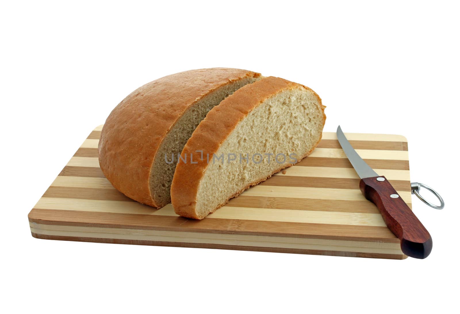 loaf of bread and knife on a cutting board