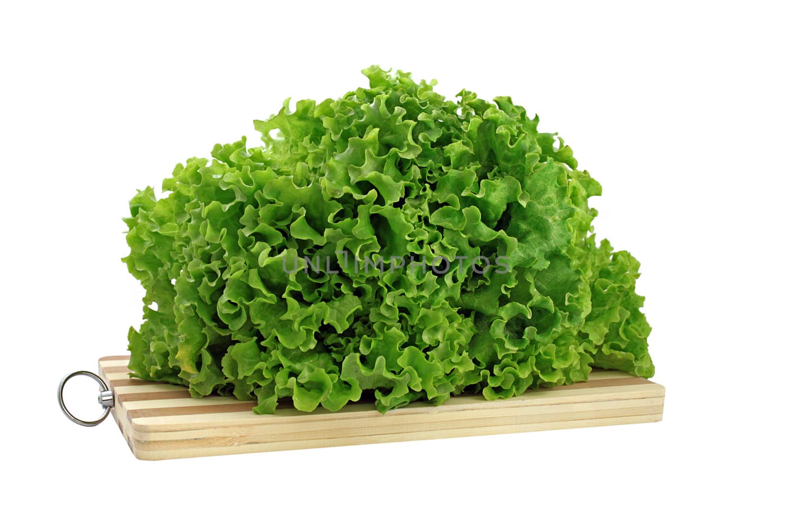lettuce on a cutting board over white