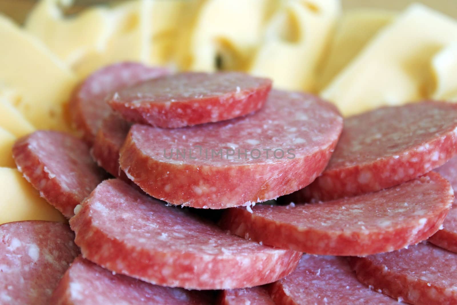 sausage and cheese on a plate