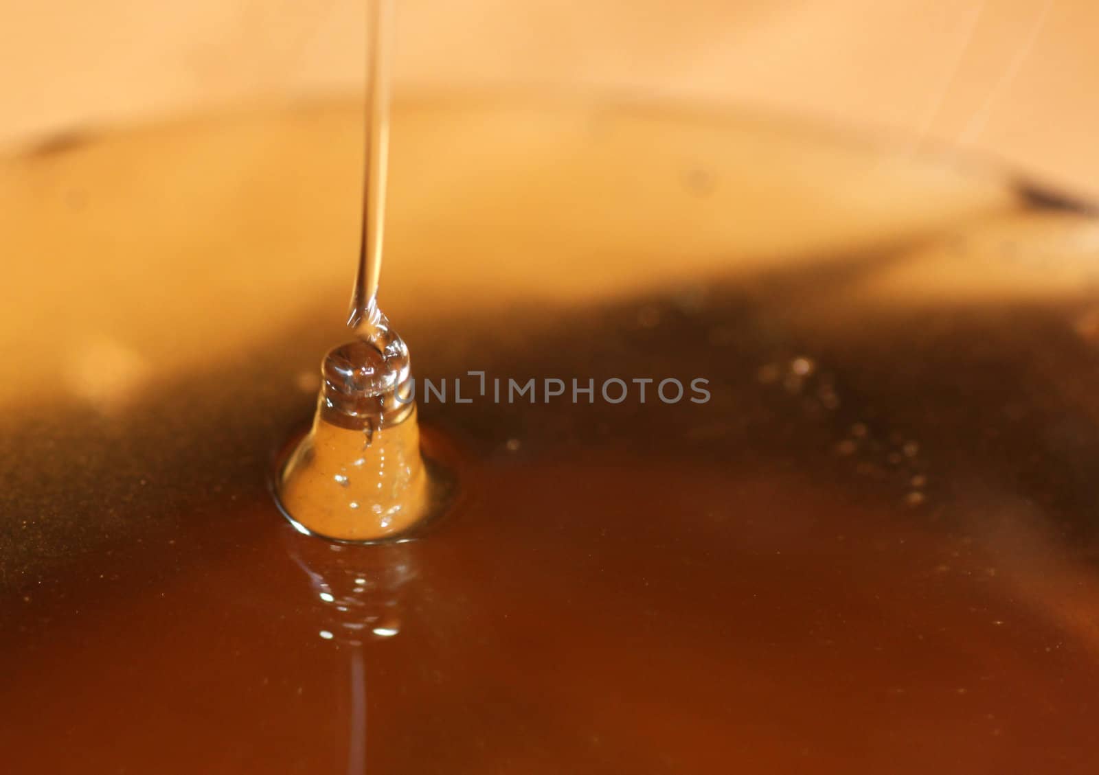 close up of pouring honey