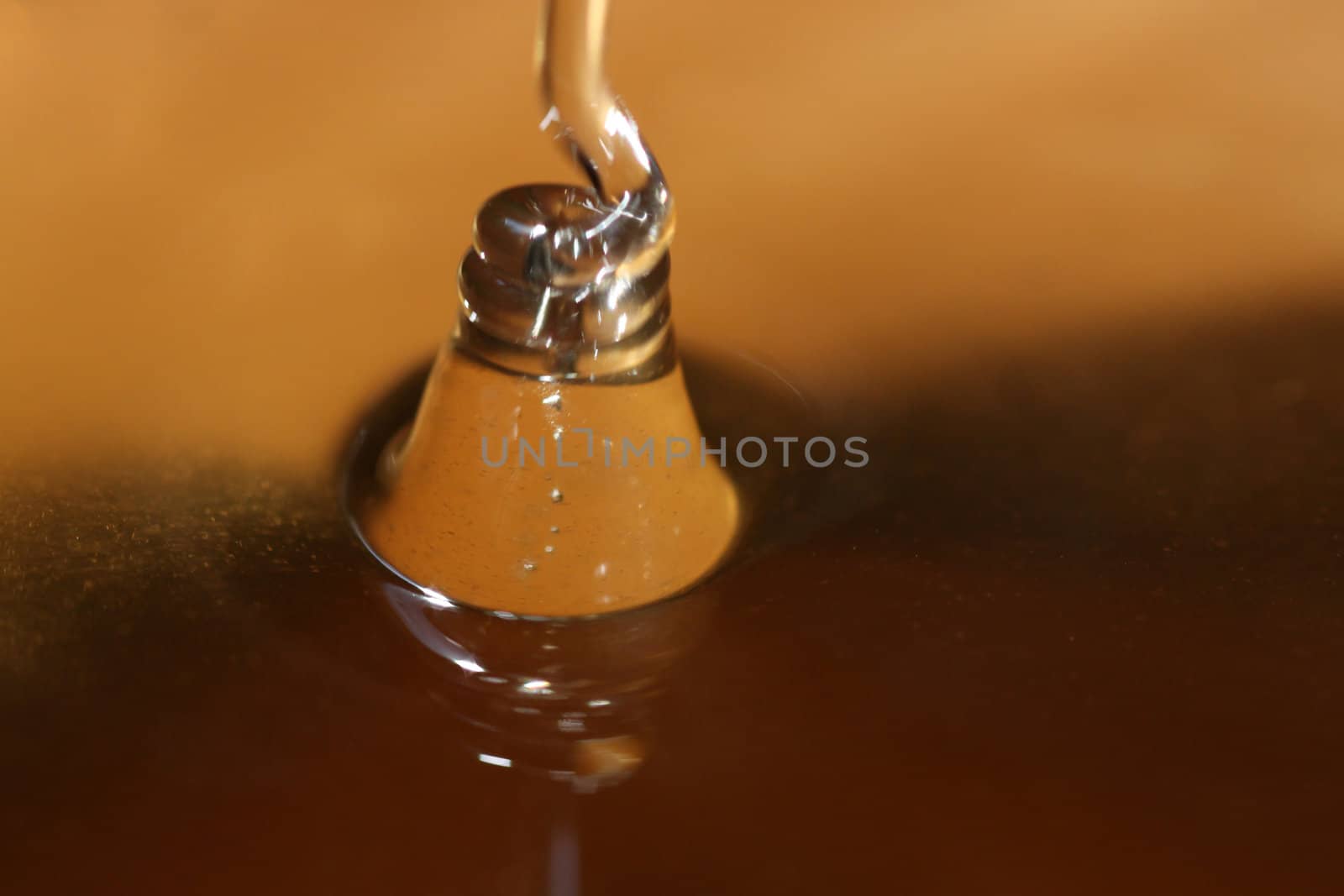 close up of pouring honey