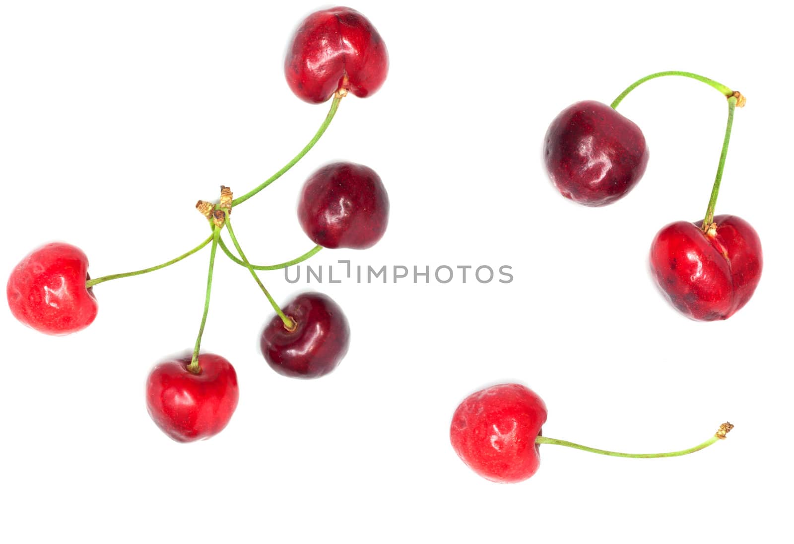 collection of fresh cherries on white background by schankz
