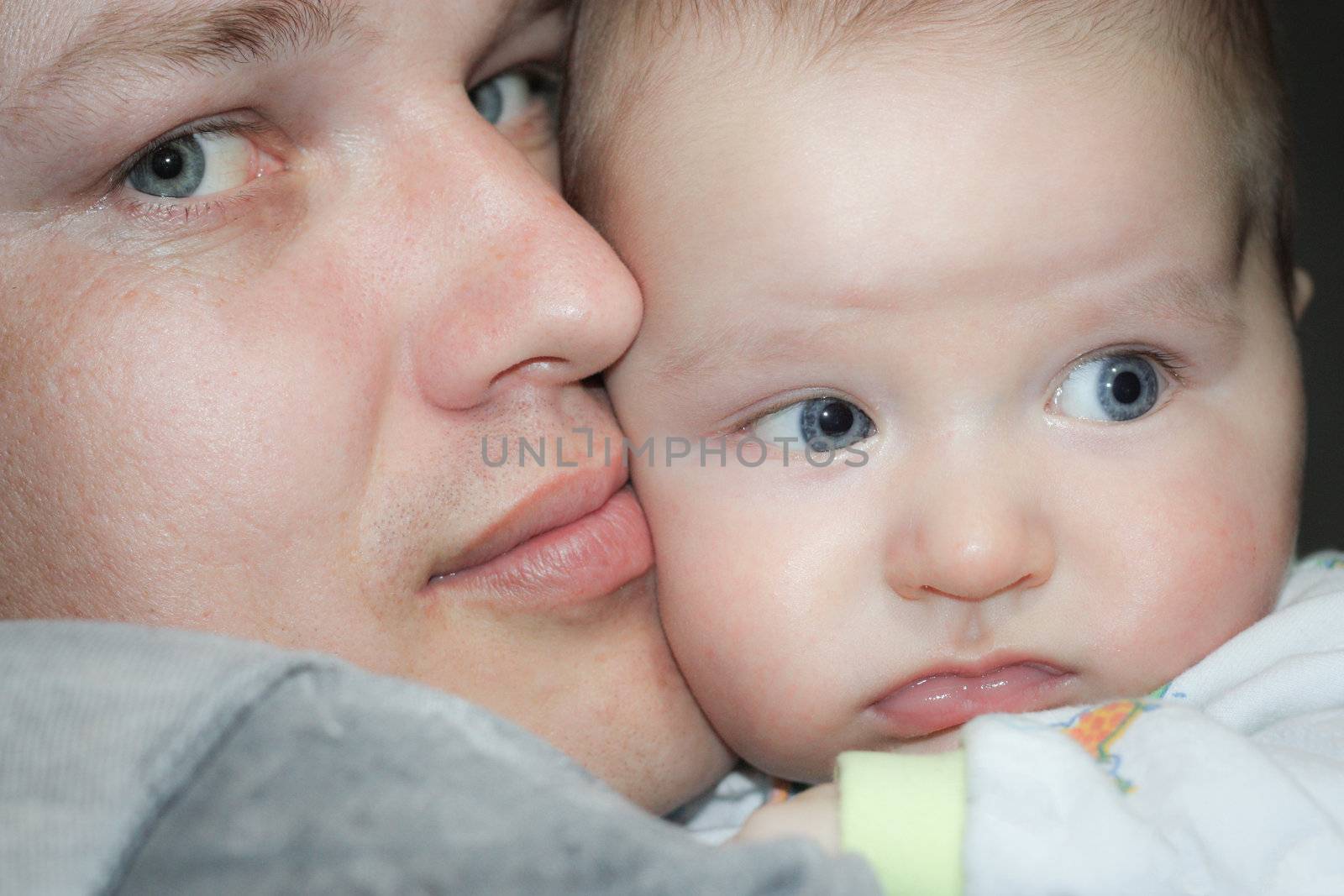 portrait of father and baby