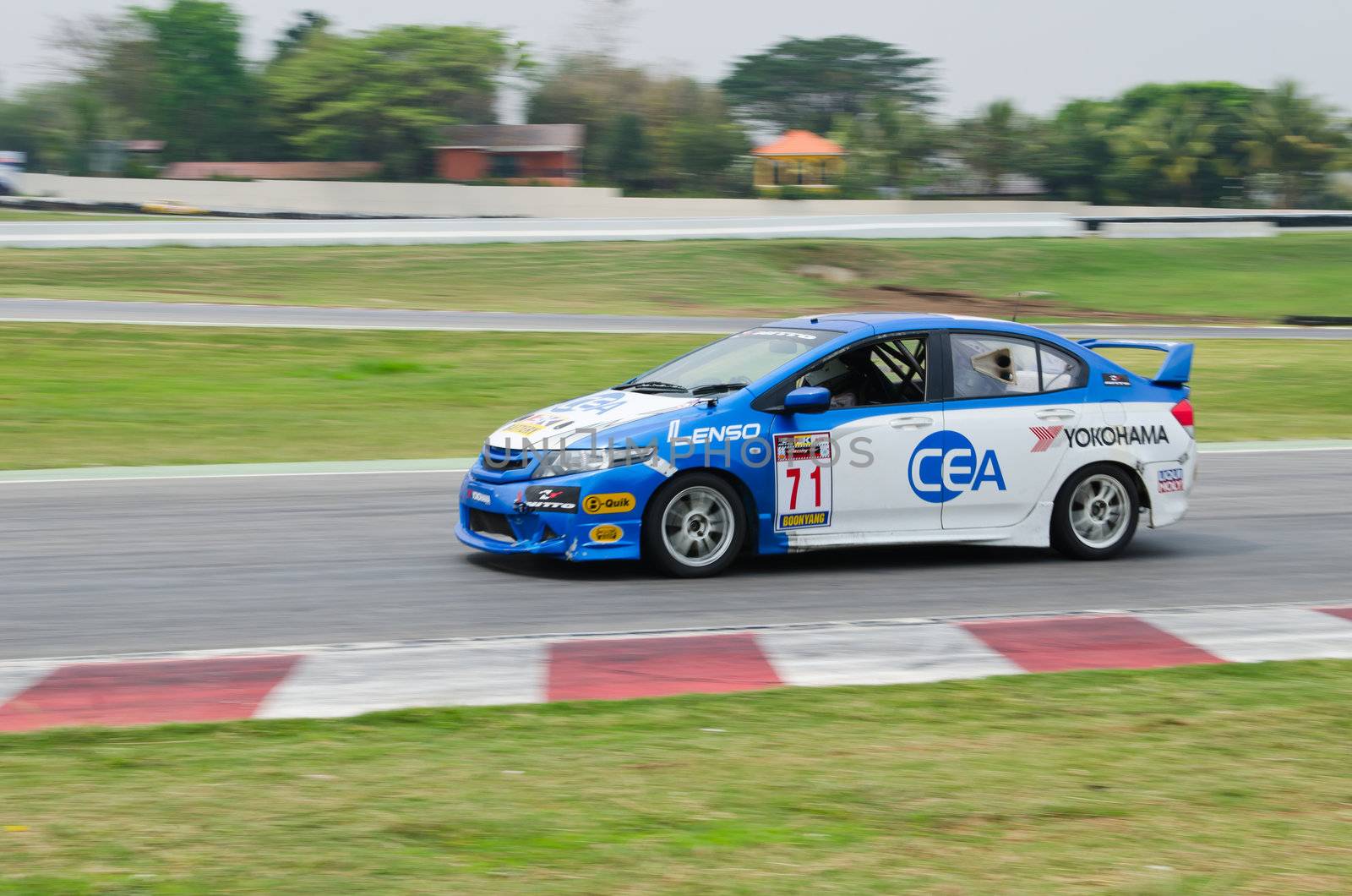 Nakhon Ratchasima, Thailand - March 9th:Unidentified car racing competitors during the "Thailand circuit 2013  " at Bonanza speedway on March 9th, 2013 in Nakhon Ratchasima, Thailand. 