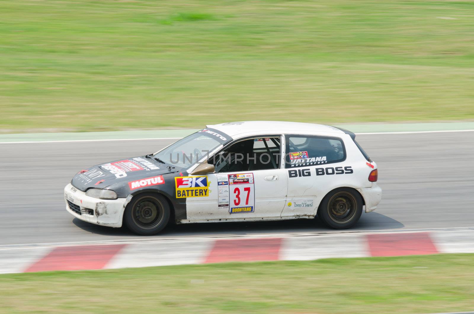 Nakhon Ratchasima, Thailand - March 9th:Unidentified car racing competitors during the "Thailand circuit 2013  " at Bonanza speedway on March 9th, 2013 in Nakhon Ratchasima, Thailand. 