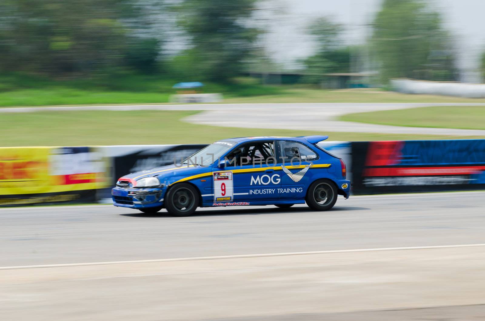Nakhon Ratchasima, Thailand - March 9th:Unidentified car racing competitors during the "Thailand circuit 2013  " at Bonanza speedway on March 9th, 2013 in Nakhon Ratchasima, Thailand. 