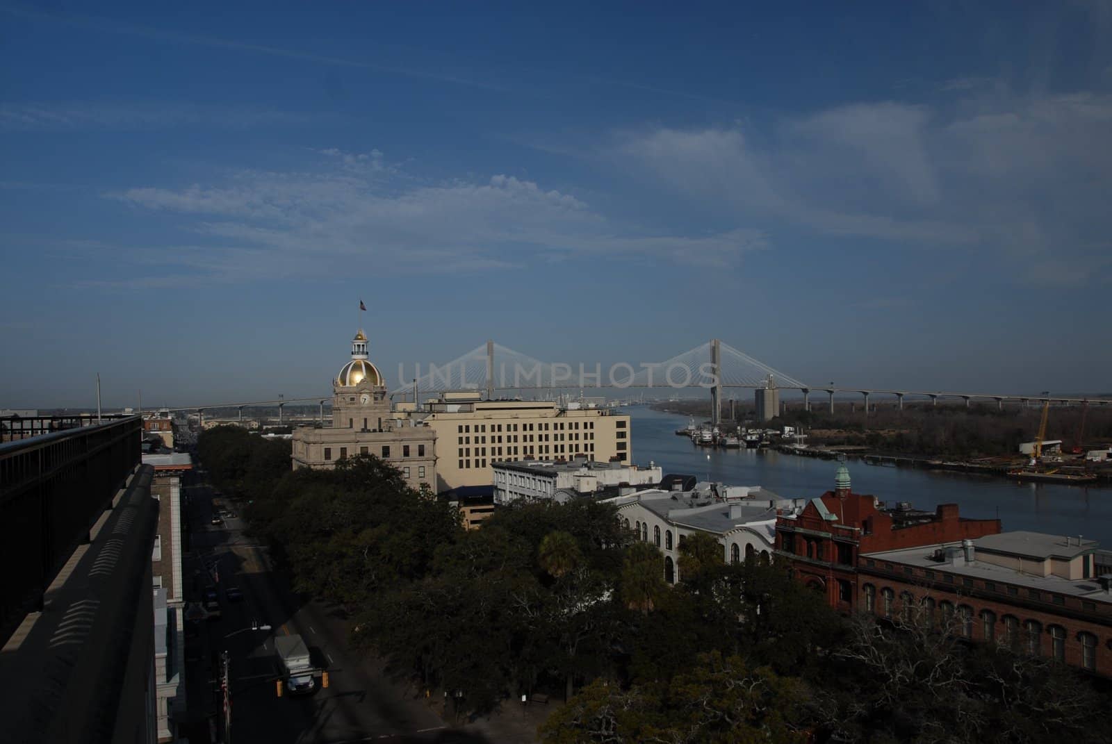 A view along the river in Savannah Georgia with the Talmadge Bridge in the background