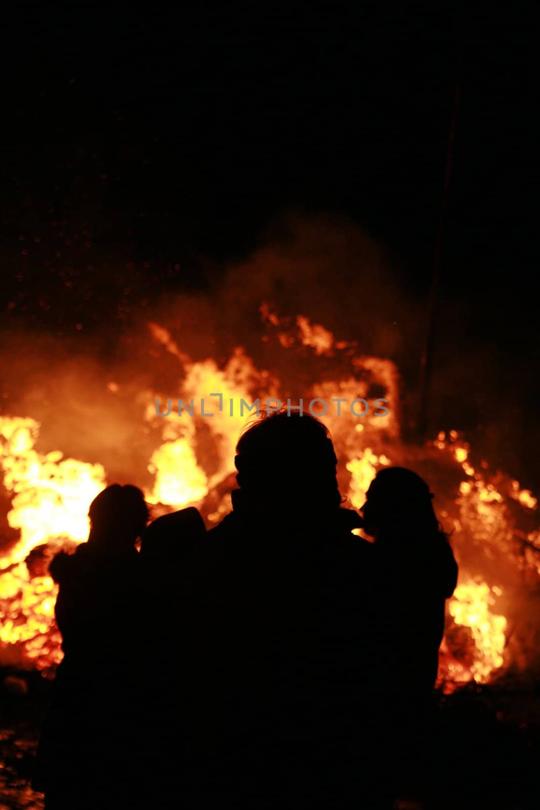 Close-up of some people coming out of fire